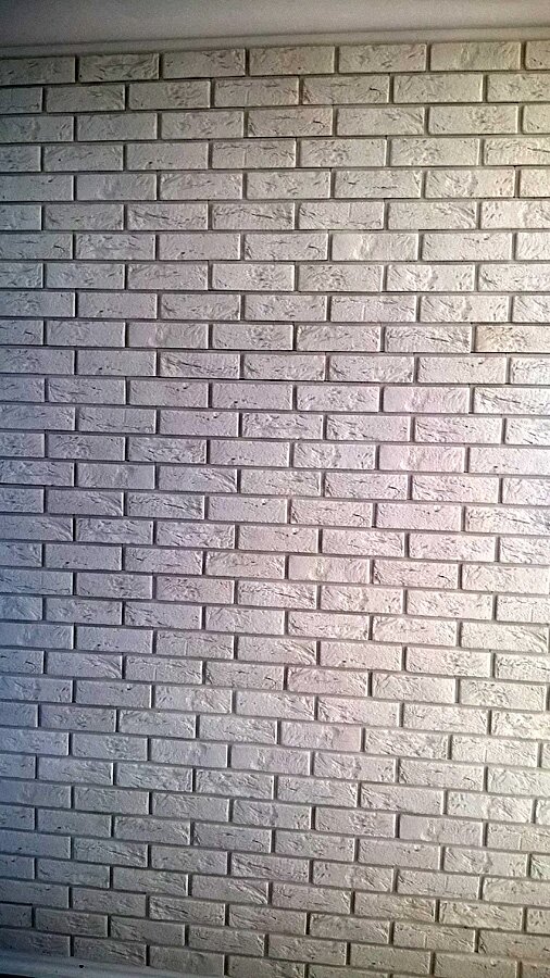 Rybnik, Brzezińska - położenie cegły dekoracyjnej na klatce schodowej - zdjęcie 3